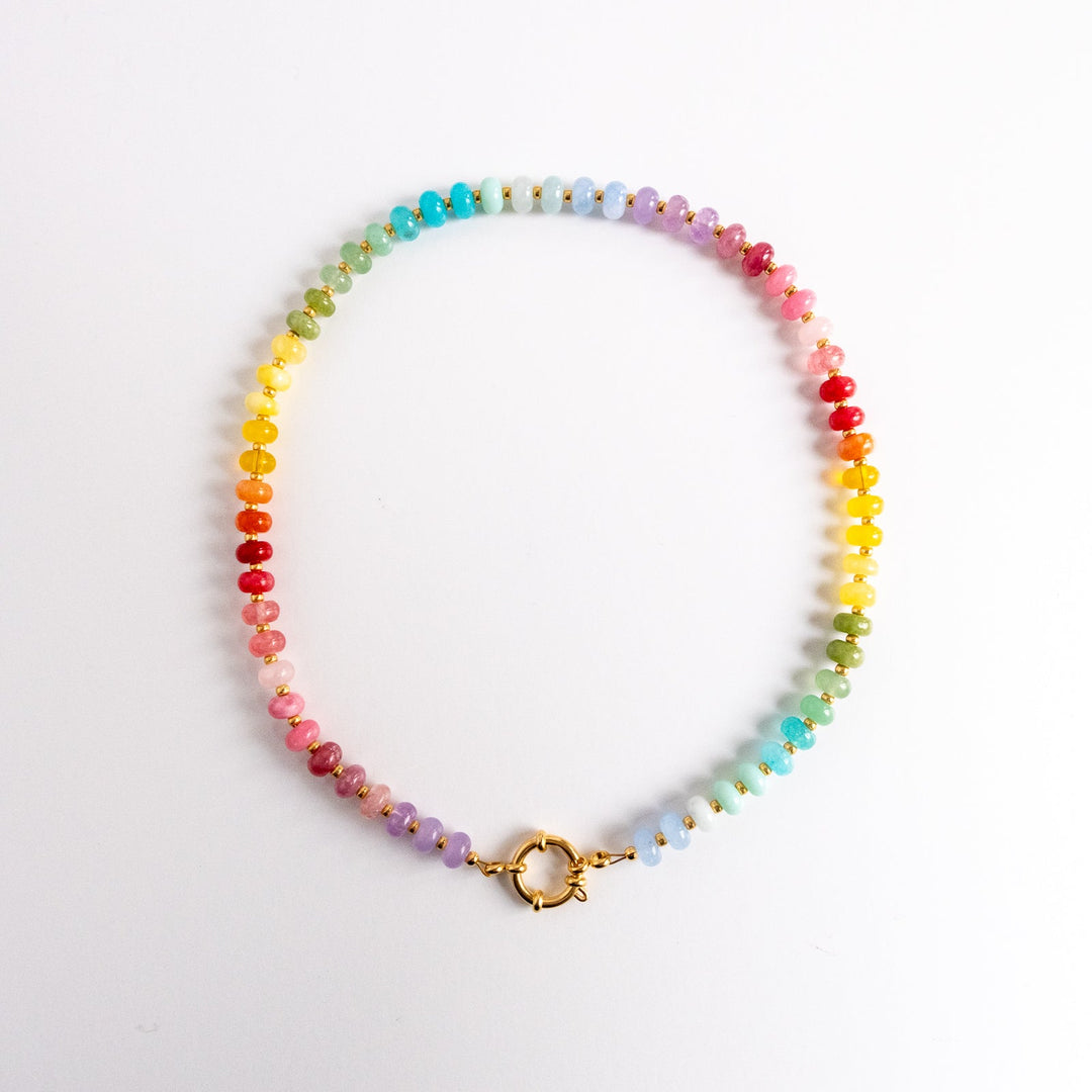 Multicolored beaded necklace on a white background