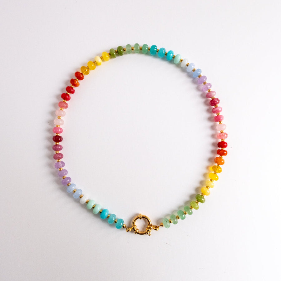 Multicolored beaded necklace on a white background