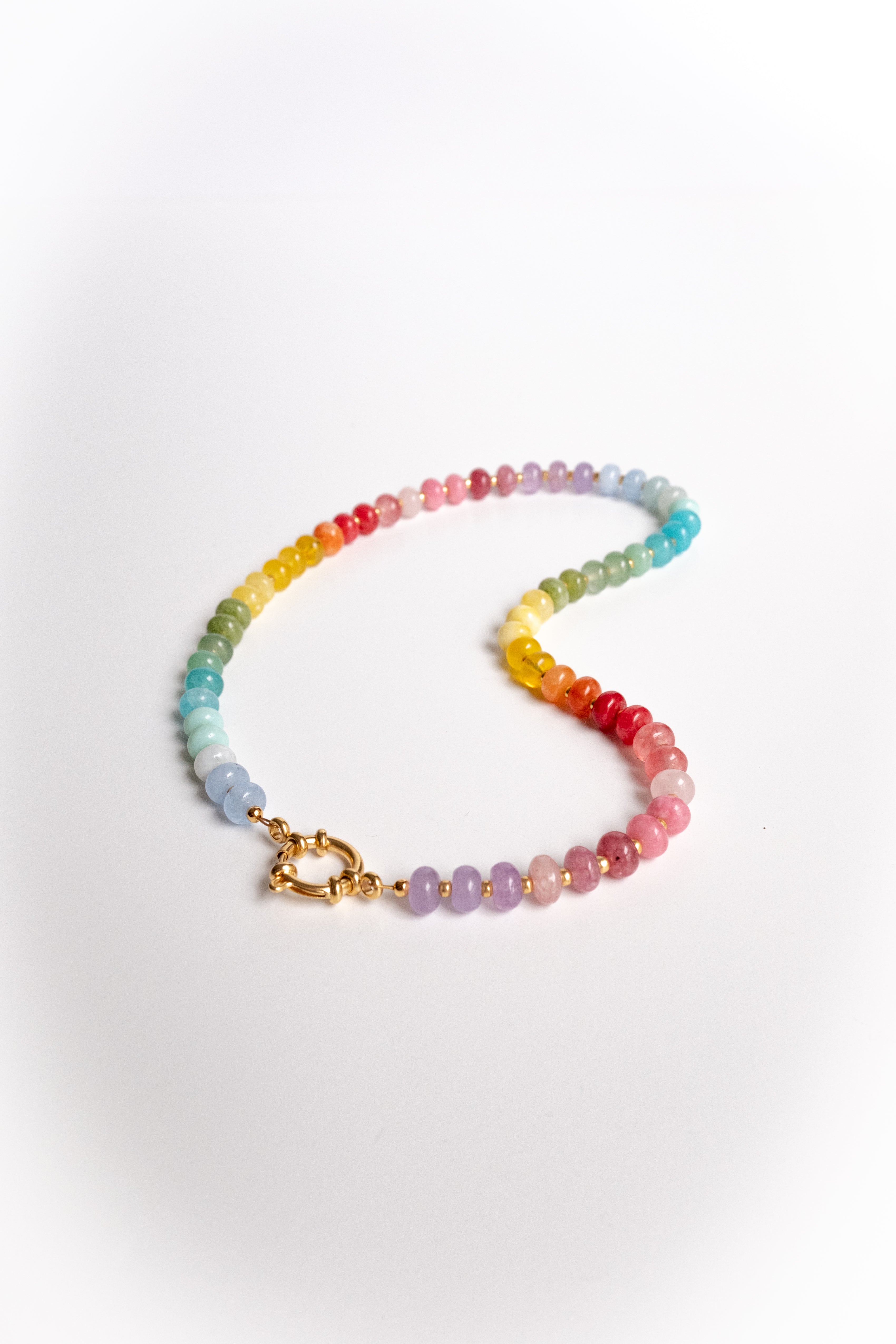 Multicolored beaded bracelet on a white background