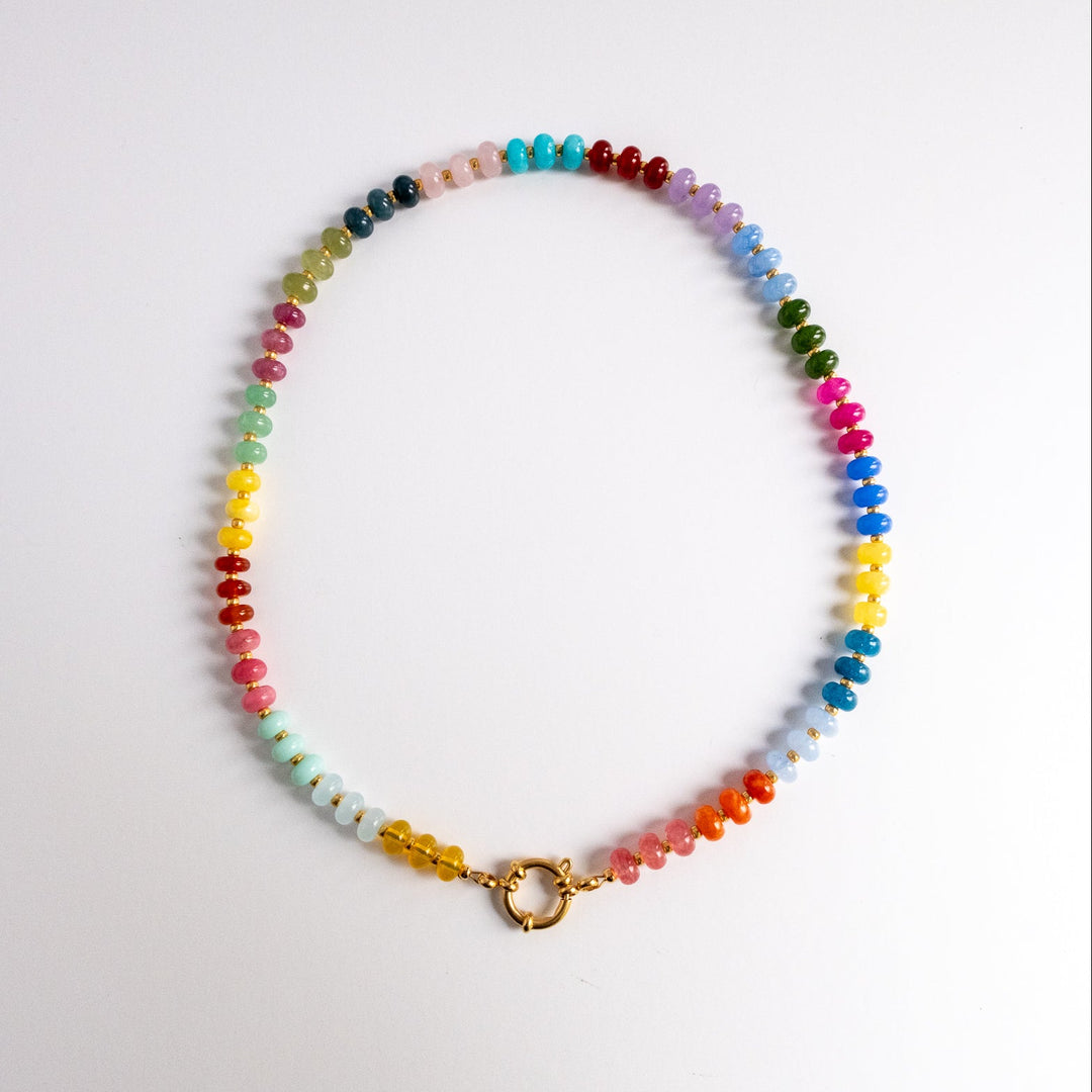 Multicolored beaded necklace on a white background